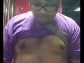 Vaibhav, a chubby Fijian man with a pot belly and man boobs, urinates publicly. His glasses fog up from his warm breath, adding a thrilling risk to his intimate act.