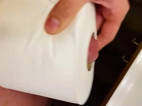 A thrilling solo session unfolds in a restroom. The guy's imagination runs wild as he pleasures himself inside a toilet paper roll, culminating in an explosive climax.