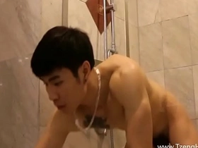 Handsome Asian jock indulges in a steamy handjob, showcasing his muscular body and impressive cock. This video offers a tantalizing mix of muscle worship and intense cumshot.