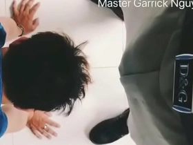Submissive Asian man, a humble dog to his boss, eagerly serves with unmatched skill. His dedication is unmatched, always ready to please, even on his knees, facing the wall. A true king's loyal servant.