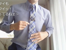As a young Asian lad, I revel in my unique fetish, dressing in my dad's suit. The tight fabric ignites a fiery desire, leading to a steamy solo session that's as naughty as it is thrilling.